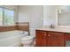 A full bathroom featuring a tub and a wood vanity cabinet at 6954 Hawthorne Trace Ln, Riverview, FL 33578