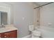 Bathroom featuring a tub and a wood vanity cabinet at 6954 Hawthorne Trace Ln, Riverview, FL 33578