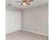 This bedroom features a ceiling fan, closet, and neutral carpet at 6954 Hawthorne Trace Ln, Riverview, FL 33578