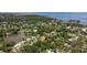 A serene waterfront view showcasing waters, piers and boats from an elevated, residential perspective at 768 Pinellas Point S Dr, St Petersburg, FL 33705