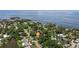 Breathtaking aerial perspective of the waterfront, with captivating views of boats, piers, and community allure at 768 Pinellas Point S Dr, St Petersburg, FL 33705