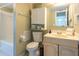 Well-lit bathroom featuring vanity, mirror, and built-in storage at 801 83Rd N Ave # 209, St Petersburg, FL 33702