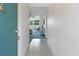 Inviting foyer with view of living area beyond at 801 83Rd N Ave # 209, St Petersburg, FL 33702