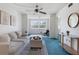Cozy living room area with neutral decor, modern furniture, and bright light at 801 83Rd N Ave # 209, St Petersburg, FL 33702