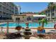 Relaxing pool area with a fountain in a courtyard setting at the condo complex at 801 83Rd N Ave # 209, St Petersburg, FL 33702