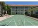 Well-maintained shuffleboard court with seating areas available for residents' enjoyment at 801 83Rd N Ave # 209, St Petersburg, FL 33702