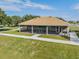 Community clubhouse featuring a screened-in lanai, providing residents with an area to relax and enjoy the outdoors at 8296 Olive Brook Dr, Wesley Chapel, FL 33545