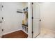 Mud room/entryway with bench seating, built in storage and decor at 8296 Olive Brook Dr, Wesley Chapel, FL 33545