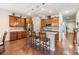 Spacious kitchen with stainless steel appliances, granite countertops, and a breakfast bar, ideal for entertaining at 8296 Olive Brook Dr, Wesley Chapel, FL 33545