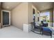 Inviting covered front porch features comfortable rocking chairs and a cozy atmosphere, perfect for relaxation at 8296 Olive Brook Dr, Wesley Chapel, FL 33545