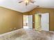 Bedroom with vaulted ceiling and connections to other parts of the house at 8576 Sandy Beach St, Tampa, FL 33634