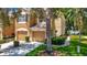 Charming townhome featuring a two-car garage and well-maintained landscaping at 8576 Sandy Beach St, Tampa, FL 33634