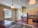 Kitchen featuring granite countertops, stainless steel appliances and hardwood floors at 8576 Sandy Beach St, Tampa, FL 33634