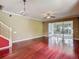 Spacious living room featuring hardwood floors, chandelier and stairway to the left at 8576 Sandy Beach St, Tampa, FL 33634