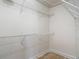 A walk-in closet is equipped with white wire shelving at 8576 Sandy Beach St, Tampa, FL 33634