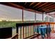 Serene screened balcony with a table, chairs, and a view of the lush landscape. Perfect for relaxing at 9484 Tara Cay Ct # 8, Seminole, FL 33776