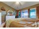 Spacious bedroom with a king bed and dresser, and access to the lanai at 9484 Tara Cay Ct # 8, Seminole, FL 33776