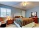 Bedroom with neutral walls and white furniture at 9484 Tara Cay Ct # 8, Seminole, FL 33776