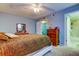 Bedroom with neutral walls and white furniture at 9484 Tara Cay Ct # 8, Seminole, FL 33776
