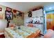 Dining room with table, wet bar, and sports decor, creating an inviting atmosphere at 9484 Tara Cay Ct # 8, Seminole, FL 33776