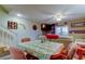 Inviting living room with a staircase, decorative elements, and a comfortable seating area at 9484 Tara Cay Ct # 8, Seminole, FL 33776