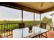 Enjoy the views from this outdoor patio with seating for four at 9484 Tara Cay Ct # 8, Seminole, FL 33776
