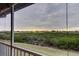 Gorgeous view of the landscape from the screened in porch at 9484 Tara Cay Ct # 8, Seminole, FL 33776