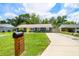 This lovely single-Gathering home has a mailbox, new driveway, and well-maintained lawn at 1005 Monroe St, Plant City, FL 33565