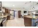 Well-equipped kitchen featuring stainless steel appliances, granite countertops, and tile flooring at 1005 Monroe St, Plant City, FL 33565