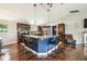 Stylish kitchen with a blue island, stainless steel appliances, and modern cabinetry at 1005 Monroe St, Plant City, FL 33565