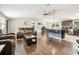 Open-concept living and kitchen area featuring hardwood floors, and stainless appliances at 1005 Monroe St, Plant City, FL 33565