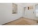 Bright entryway boasts neutral-toned tile flooring, crisp white walls, and ample natural light at 1013 N Bask Dr, Tampa, FL 33603