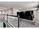 Home theater area with tiered seating featuring reclining chairs and a large screen at 10517 Crestview Heights Ave, Thonotosassa, FL 33592