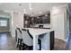 The kitchen showcases stainless appliances, gray cabinets, and a center island with pendant lights at 10517 Crestview Heights Ave, Thonotosassa, FL 33592
