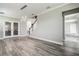 This home features LVP floors, modern lighting, crown molding, and a stairway to the second floor at 10517 Crestview Heights Ave, Thonotosassa, FL 33592