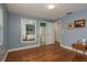 Cozy bedroom with ample closet space and a view into the bathroom at 1065 Tartan Dr # C, Palm Harbor, FL 34684