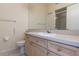 Classic-style bathroom features a vanity with lots of storage and a shower with a sliding glass door at 1126 Haley Ln, Dunedin, FL 34698