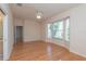 Spacious living room with a bay window and a doorway leading to another room at 1126 Haley Ln, Dunedin, FL 34698