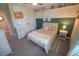 Cozy bedroom with soft decor, custom wainscoting, and overhead shelves filled with stuffed animals at 13103 Monach Isles Dr, Riverview, FL 33579