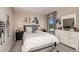 A bedroom showcases black and white decor with zebra accents, decorative bedding, and natural light at 13722 Heartwood Way, Parrish, FL 34219