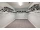 Large walk-in closet providing ample storage space with wire shelving and space for organization at 13722 Heartwood Way, Parrish, FL 34219