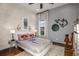 Charming bedroom with a decorative brick wall and stylish decor at 13726 Heartwood Way, Parrish, FL 34219