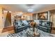 Living room with view to kitchen at 14560 Haddon Mist Dr, Wimauma, FL 33598