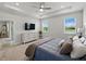 Spacious primary bedroom suite with tray ceiling, and a serene view at 152 Bright Ibis Ave, Apollo Beach, FL 33572