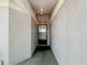 Narrow entrance way to the front door at 1556 Lynda Ln, Dunedin, FL 34698