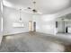 Large living room with ample natural light and neutral paint at 1556 Lynda Ln, Dunedin, FL 34698