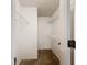 Walk-in closet with shelving for organized storage at 1556 Lynda Ln, Dunedin, FL 34698