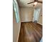 Bedroom featuring wood-look flooring, neutral walls, and a ceiling fan at 1675 13Th S Ave, St Petersburg, FL 33712