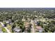 Extensive aerial view capturing a sprawling residential area with a mix of homes nestled among abundant trees at 1813 Nova Dr, Valrico, FL 33596