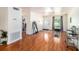 Inviting living room with hardwood floors, white walls, and modern furnishings at 1813 Nova Dr, Valrico, FL 33596